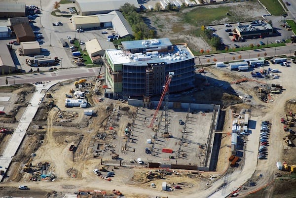 Looking SW at new UIHC Clinic, parking ramp, and streets under construction in the Iowa River Landing.