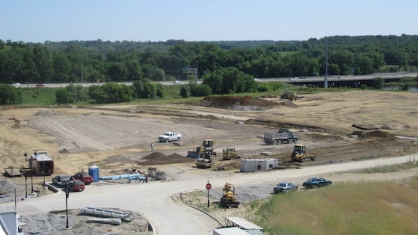Placing sub-base rock on Von Maur East parking lot